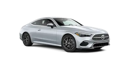 Silver Mercedes-Benz luxury coupe shown in a front three-quarter view, featuring a sleek aerodynamic body, sculpted side panels, sporty alloy wheels, LED headlights, a prominent Mercedes-Benz grille emblem, and a low-profile performance design on a transparent background.