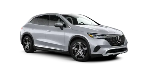 Silver Mercedes-Benz electric crossover SUV shown in a front three-quarter view on a black background, featuring the Mercedes three-pointed-star grille emblem, sleek LED headlights, aerodynamic body styling, alloy wheels, and a modern sloping roofline.